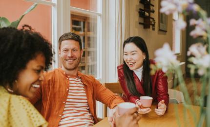 group of people smiling and laughing