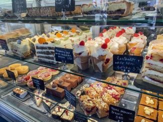 cake shop window full of cakes