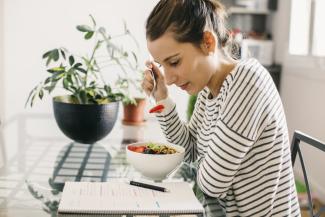 woman eating cereal