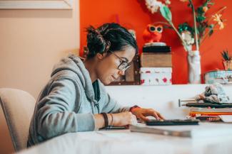 Young women looking at a laptop