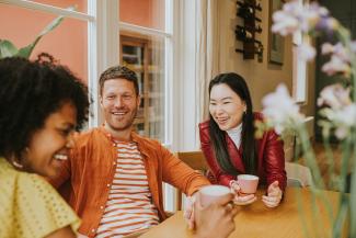 group of people smiling and laughing